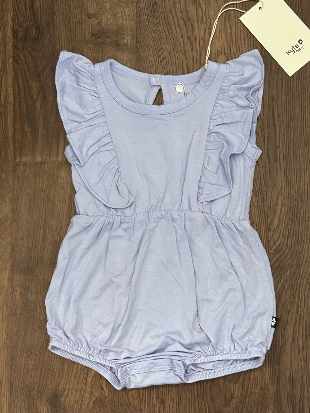 Kyte Short Sleeve Bubble Romper with Ruffles in Lilac 6-12m